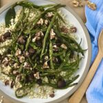 Overhead picture of roasted green beans and mushrooms over top of a bed of toasted barley.