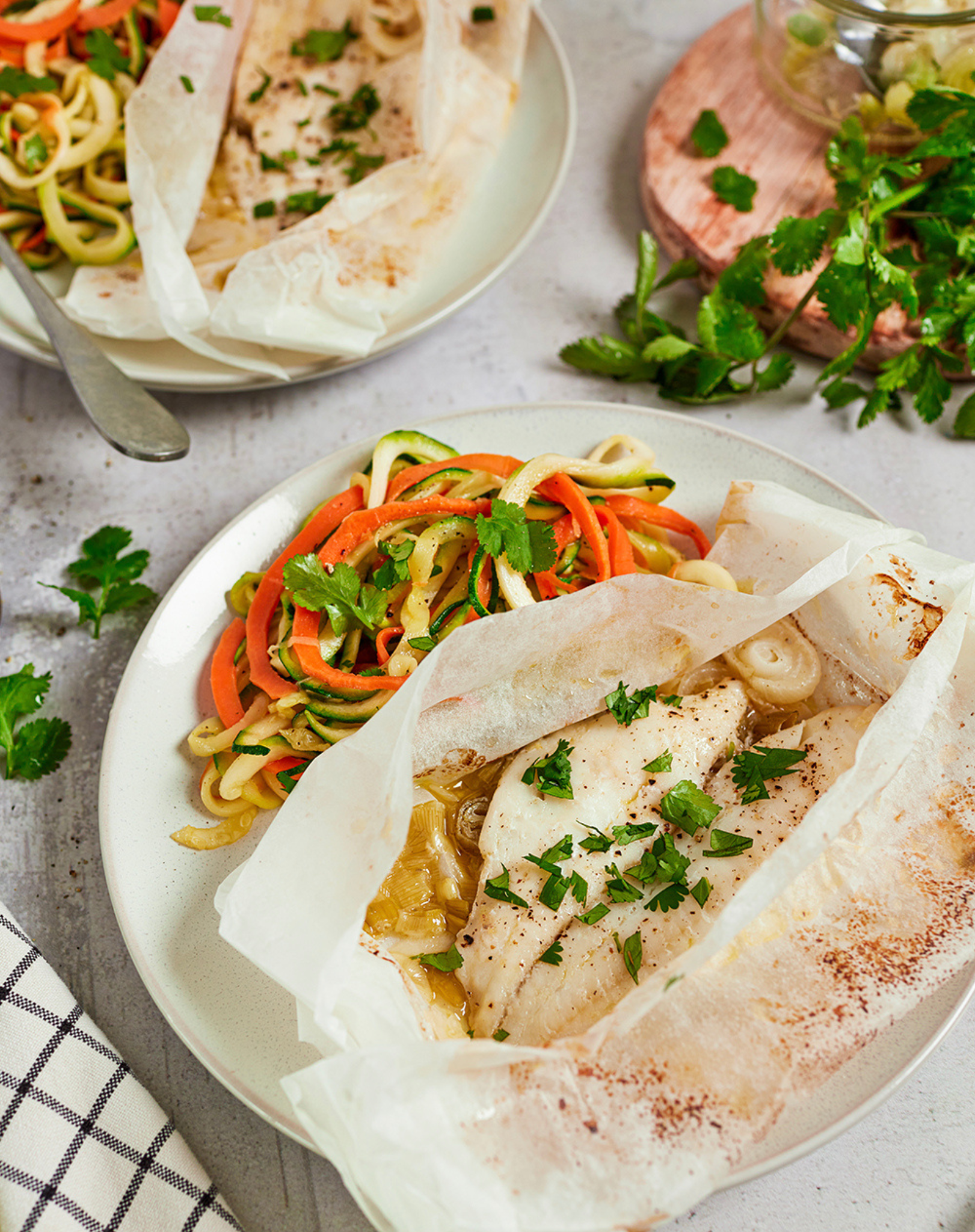 WHITE FISH FILET EN PAPILLOTE WITH SPIRALIZED CARROT AND ZUCCHINI